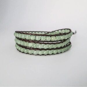 Caroline Roussel Jewelry; 3 times wrap bracelet; jade beads & leather.